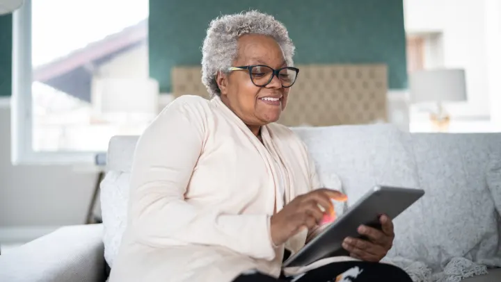 elderly woman on tablet